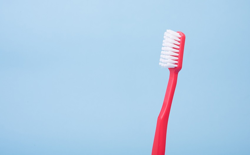 Toothbrush to clean glass shower screen